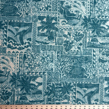 Load image into Gallery viewer, Kaiʻolu Teal reverse aloha print fabric shown with a ruler for scale